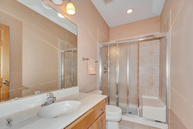 10754 Canterbury Dr, Mokena, IL 60448 - bathroom with vanity, a shower stall, tile patterned flooring, and recessed lighting