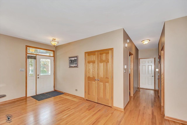 10754 Canterbury Dr, Mokena, IL 60448 - foyer entrance featuring light wood-style floors and baseboards