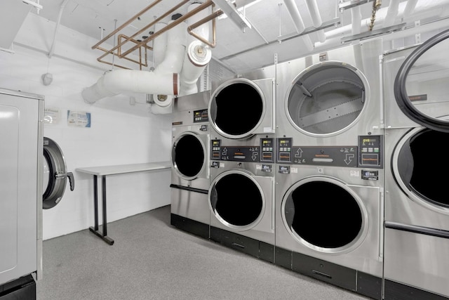3600 N Lake Shore Dr Unit 1004, Chicago, IL 60613 - shared laundry featuring stacked washer and clothes dryer and washing machine and dryer