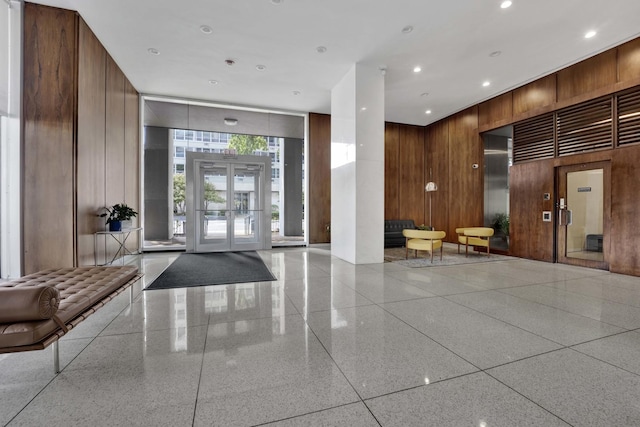 3600 N Lake Shore Dr Unit 1004, Chicago, IL 60613 - community lobby featuring wooden walls, expansive windows, and recessed lighting