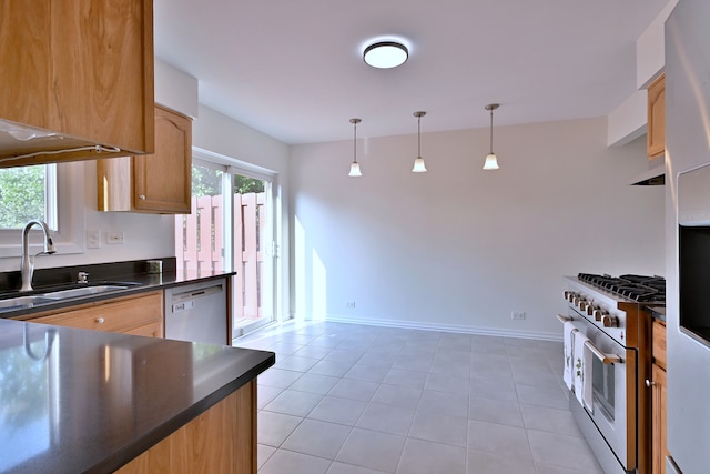 300 Duane St Unit 6, Glen Ellyn, IL 60137 - kitchen featuring stainless steel appliances, dark countertops, under cabinet range hood, and light tile patterned floors