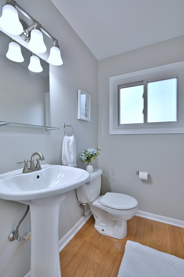 300 Duane St Unit 6, Glen Ellyn, IL 60137 - half bath featuring baseboards and wood finished floors