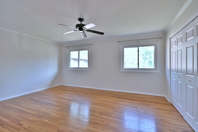 300 Duane St Unit 6, Glen Ellyn, IL 60137 - unfurnished bedroom with crown molding, light wood-type flooring, a closet, and ceiling fan