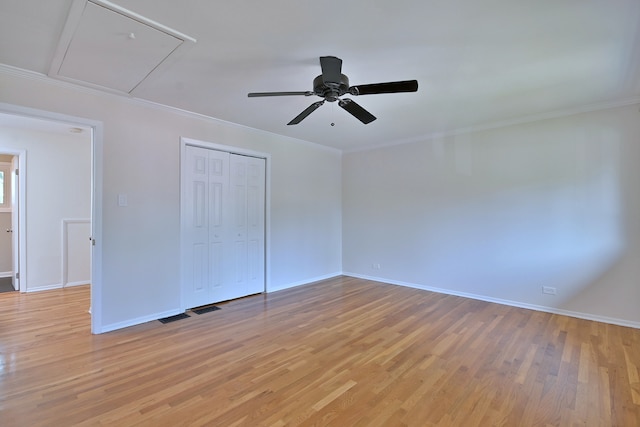 300 Duane St Unit 6, Glen Ellyn, IL 60137 - unfurnished room featuring attic access, light wood-style floors, a ceiling fan, and crown molding