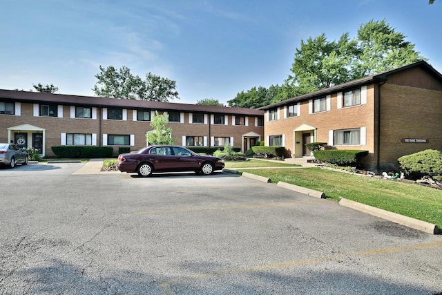 300 Duane St Unit 6, Glen Ellyn, IL 60137 - view of property featuring uncovered parking