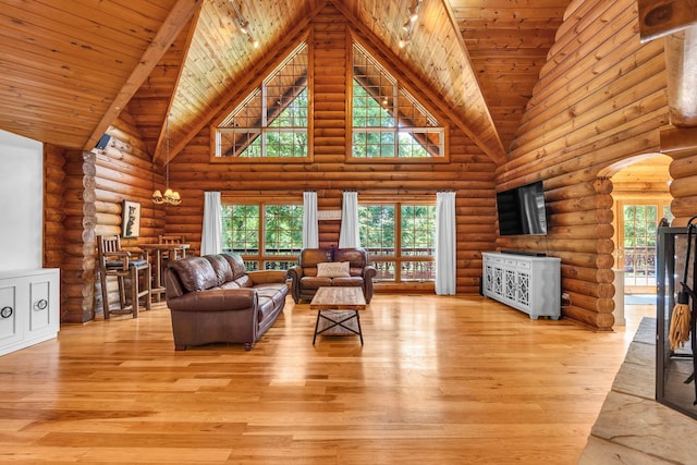 3903 Niblick Ct, Crystal Lake, IL 60012 - living room with high vaulted ceiling, arched walkways, log walls, wood-type flooring, and wooden ceiling