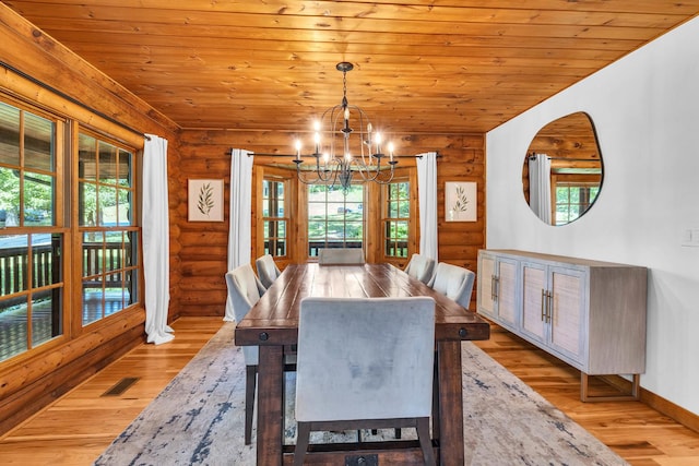 3903 Niblick Ct, Crystal Lake, IL 60012 - dining space featuring log walls, light wood-style flooring, a chandelier, and wooden ceiling