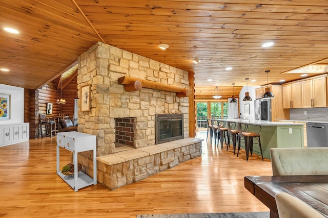 3903 Niblick Ct, Crystal Lake, IL 60012 - living area featuring wood ceiling, light wood-style floors, rustic walls, and a stone fireplace