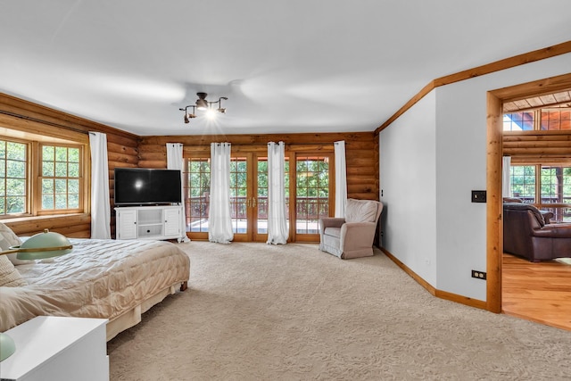 3903 Niblick Ct, Crystal Lake, IL 60012 - bedroom featuring log walls, multiple windows, access to outside, carpet flooring, and french doors