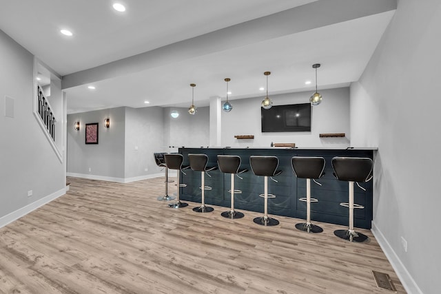 3903 Niblick Ct, Crystal Lake, IL 60012 - indoor wet bar featuring wood finished floors, recessed lighting, decorative light fixtures, and stairway