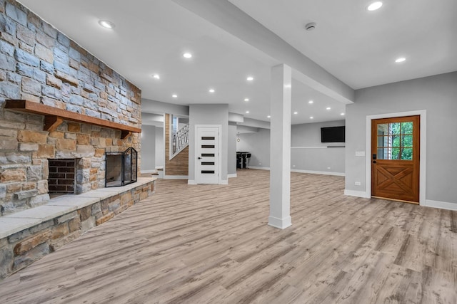 3903 Niblick Ct, Crystal Lake, IL 60012 - unfurnished living room with a fireplace, stairs, light wood-type flooring, and recessed lighting