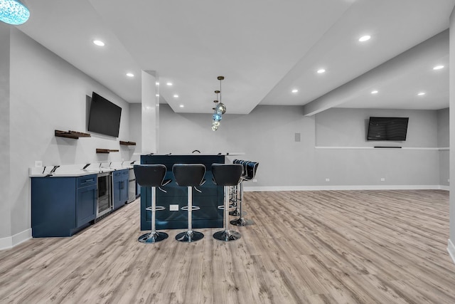 3903 Niblick Ct, Crystal Lake, IL 60012 - indoor wet bar featuring beverage cooler, light wood-style floors, recessed lighting, and hanging light fixtures