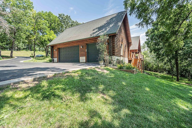 3903 Niblick Ct, Crystal Lake, IL 60012 - view of home's exterior featuring asphalt driveway, log siding, a lawn, a garage, and stone siding