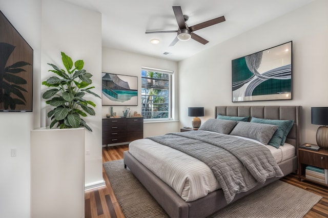 150 W Superior St Unit 605, Chicago, IL 60654 - bedroom with wood finished floors and a ceiling fan