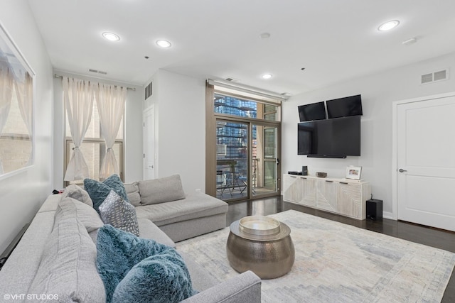 150 W Superior St Unit 605, Chicago, IL 60654 - living room featuring dark wood-style flooring and recessed lighting