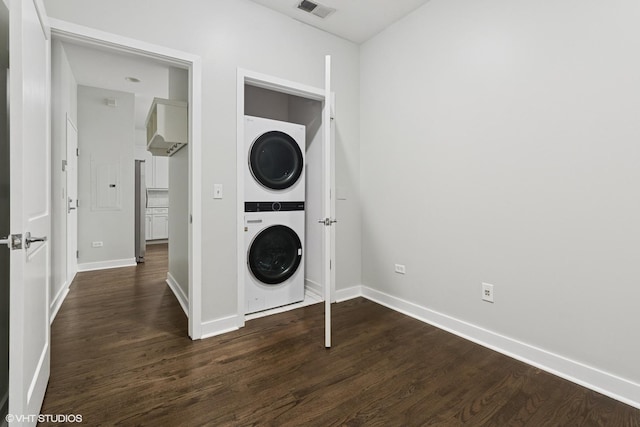 150 W Superior St Unit 605, Chicago, IL 60654 - laundry room featuring stacked washer / drying machine and dark wood-style floors