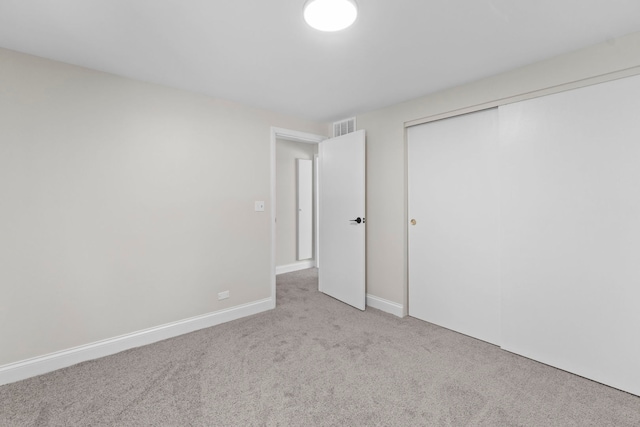 1022 Ashton Ct, Streamwood, IL 60107 - unfurnished bedroom featuring carpet flooring and a closet