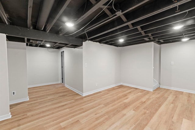 1022 Ashton Ct, Streamwood, IL 60107 - finished basement featuring wood finished floors and baseboards