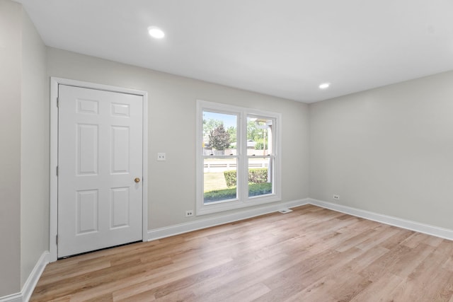 1022 Ashton Ct, Streamwood, IL 60107 - spare room featuring light wood-style flooring and recessed lighting