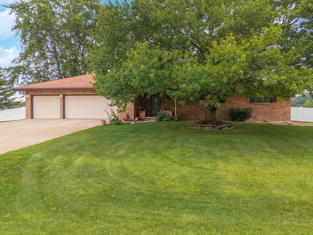 16064 Raintree Rd, Bloomington, IL 61705 - view of front of property featuring concrete driveway, brick siding, and an attached garage