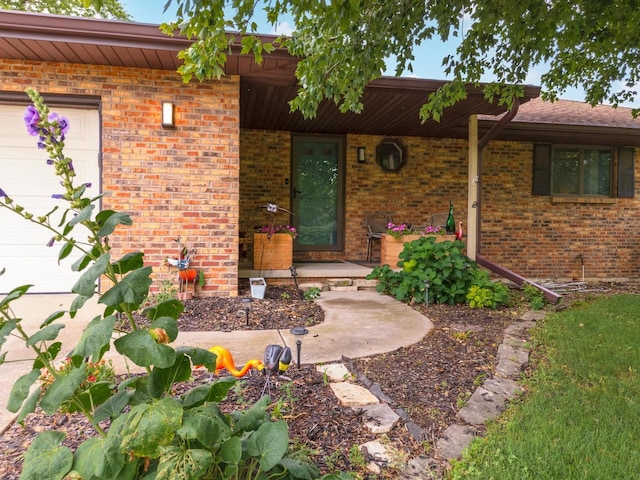 16064 Raintree Rd, Bloomington, IL 61705 - doorway to property featuring brick siding and covered porch
