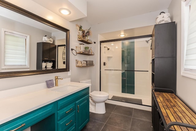 16064 Raintree Rd, Bloomington, IL 61705 - bathroom featuring vanity, a shower stall, and tile patterned floors