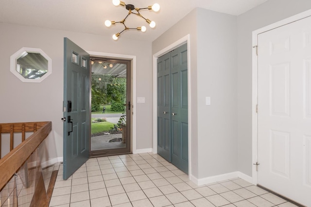 16064 Raintree Rd, Bloomington, IL 61705 - foyer entrance featuring a chandelier and light tile patterned floors