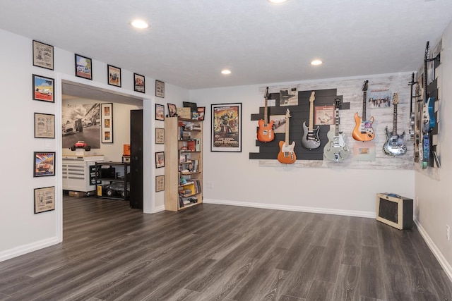 16064 Raintree Rd, Bloomington, IL 61705 - unfurnished living room with wood finished floors and recessed lighting