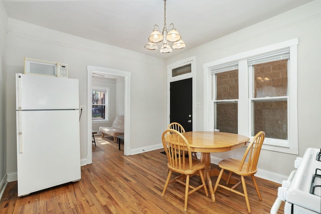 1630 S Fairfield Ave, Chicago, IL 60608 - dining room with a chandelier and wood finished floors