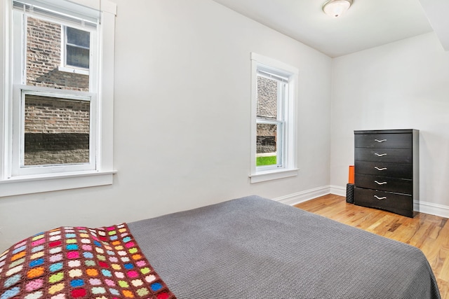 1630 S Fairfield Ave, Chicago, IL 60608 - unfurnished bedroom featuring light wood-style flooring and baseboards