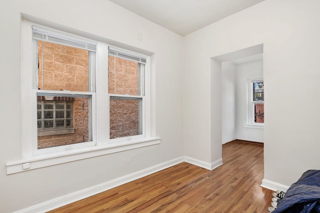 1630 S Fairfield Ave, Chicago, IL 60608 - empty room featuring wood finished floors and baseboards