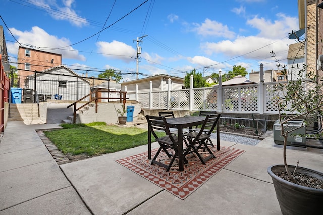1630 S Fairfield Ave, Chicago, IL 60608 - fenced backyard with a patio and outdoor dining space