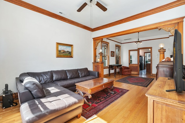 1630 S Fairfield Ave, Chicago, IL 60608 - living area with light wood-style flooring, crown molding, and a ceiling fan