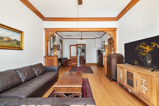 1630 S Fairfield Ave, Chicago, IL 60608 - living area featuring crown molding and light wood-style floors