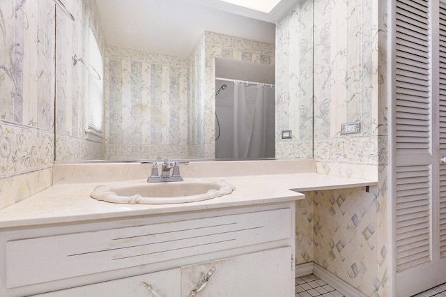 712 Central Park Ave, Flossmoor, IL 60422 - bathroom featuring vanity, tile patterned flooring, and wallpapered walls