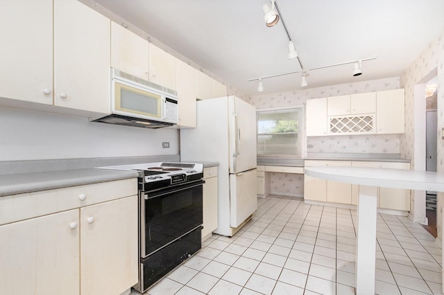 712 Central Park Ave, Flossmoor, IL 60422 - kitchen with white appliances, light countertops, light tile patterned flooring, wallpapered walls, and rail lighting
