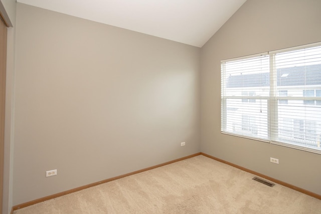16409 Teton Dr Unit D, Lockport, IL 60441 - unfurnished room with lofted ceiling and light colored carpet