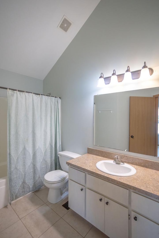 16409 Teton Dr Unit D, Lockport, IL 60441 - bathroom featuring vanity, tile patterned flooring, vaulted ceiling, and shower / bathtub combination with curtain