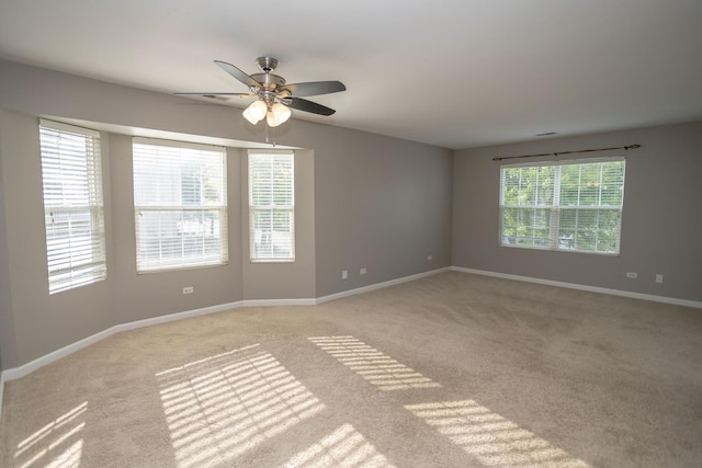 16409 Teton Dr Unit D, Lockport, IL 60441 - unfurnished room featuring light colored carpet and ceiling fan