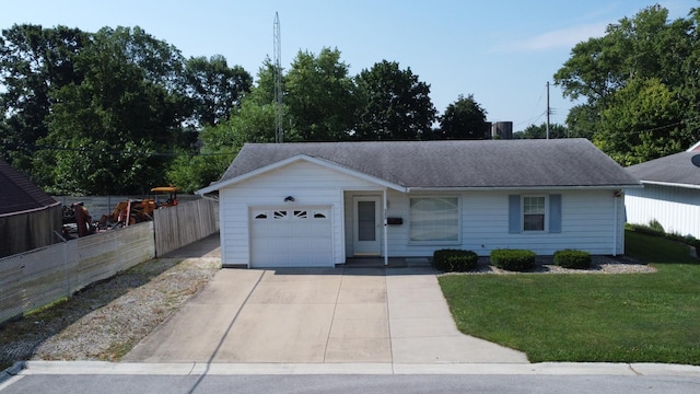 100 W Herron Ct, Watseka, IL 60970 - ranch-style home featuring concrete driveway, an attached garage, and roof with shingles