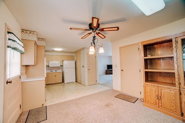 100 W Herron Ct, Watseka, IL 60970 - kitchen with white appliances, a ceiling fan, light countertops, and tasteful backsplash
