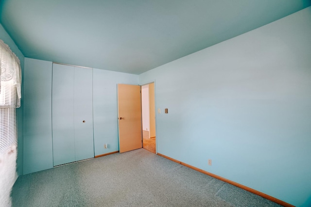 100 W Herron Ct, Watseka, IL 60970 - unfurnished bedroom with carpet and a closet