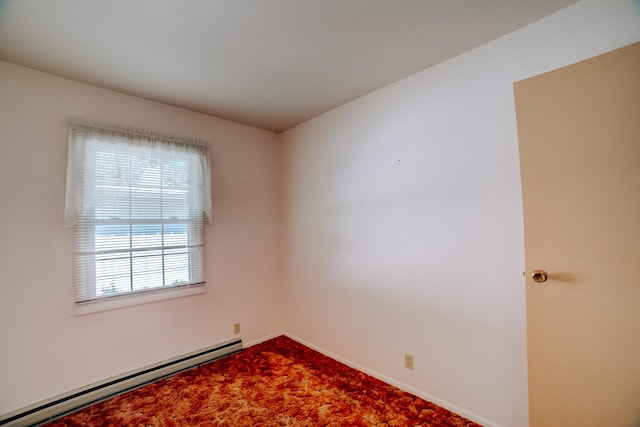 100 W Herron Ct, Watseka, IL 60970 - carpeted empty room with baseboard heating and baseboards