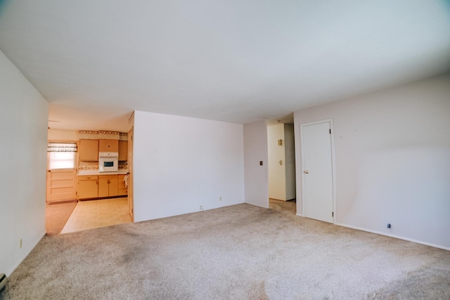 100 W Herron Ct, Watseka, IL 60970 - unfurnished room with light colored carpet
