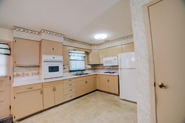 100 W Herron Ct, Watseka, IL 60970 - kitchen with white appliances, cream cabinetry, light countertops, and decorative backsplash