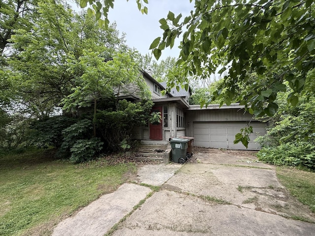 120 S Wabash Ave, Glenwood, IL 60425 - view of home's exterior with driveway and an attached garage