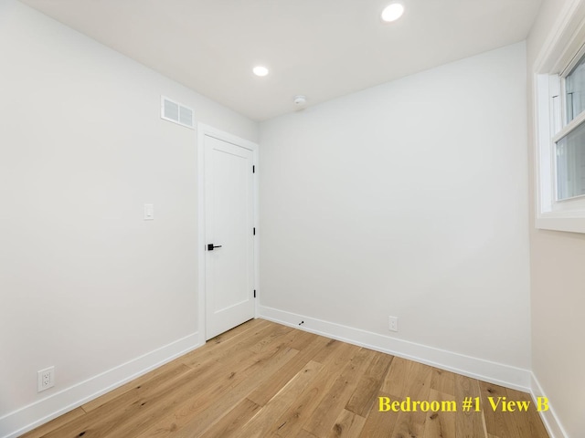 5028 Coyle Ave, Skokie, IL 60077 - spare room featuring light wood-type flooring, recessed lighting, and a smoke detector
