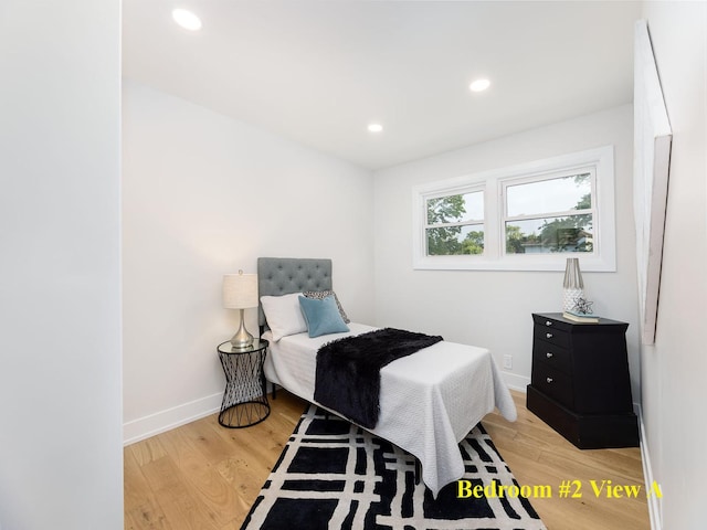 5028 Coyle Ave, Skokie, IL 60077 - bedroom with light wood-style flooring and recessed lighting