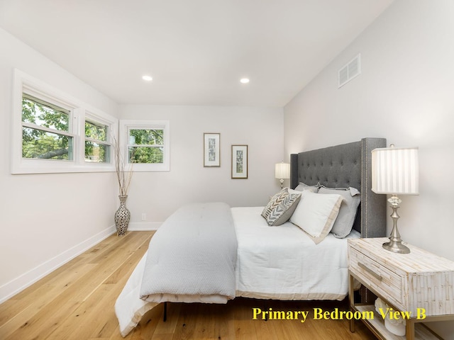 5028 Coyle Ave, Skokie, IL 60077 - bedroom with light wood-style floors and recessed lighting