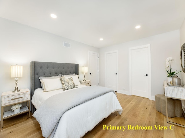 5028 Coyle Ave, Skokie, IL 60077 - bedroom with light wood-style floors and recessed lighting
